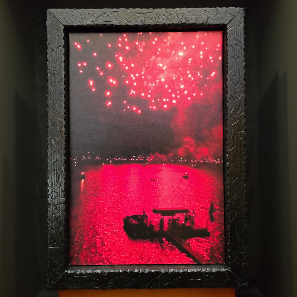 large framed original John Hummel photograph featuring vivid red fireworks over Big Bear Lake California reflected on water at night