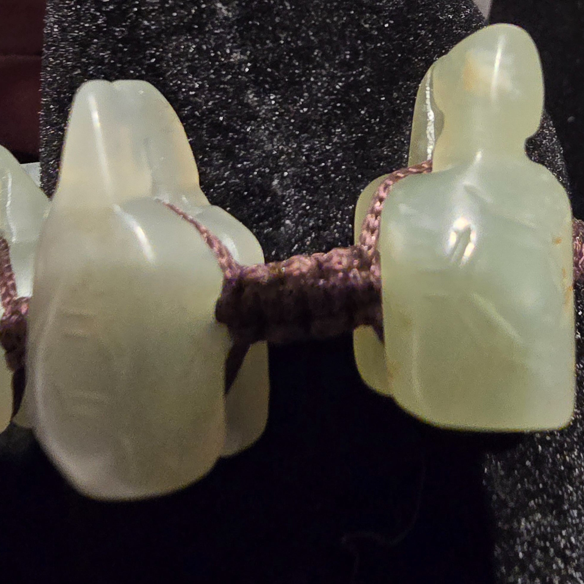 natural jade turtle charm bracelet with hand carved jade beads on adjustable woven cord symbolic Chinese luck jewelry