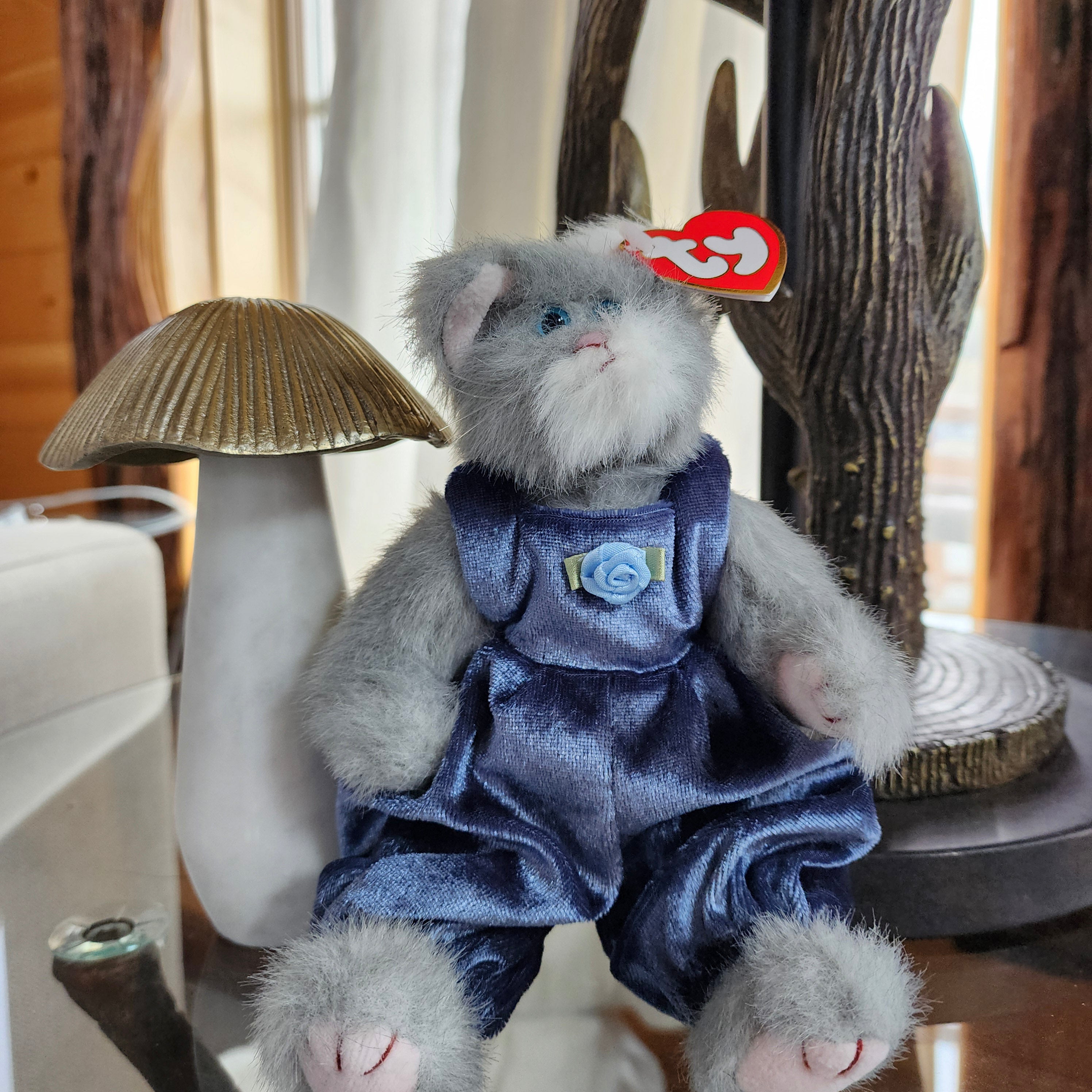 Ty Beanie Babies 'Whiskers the Cat', a plush cat with a blue outfit,