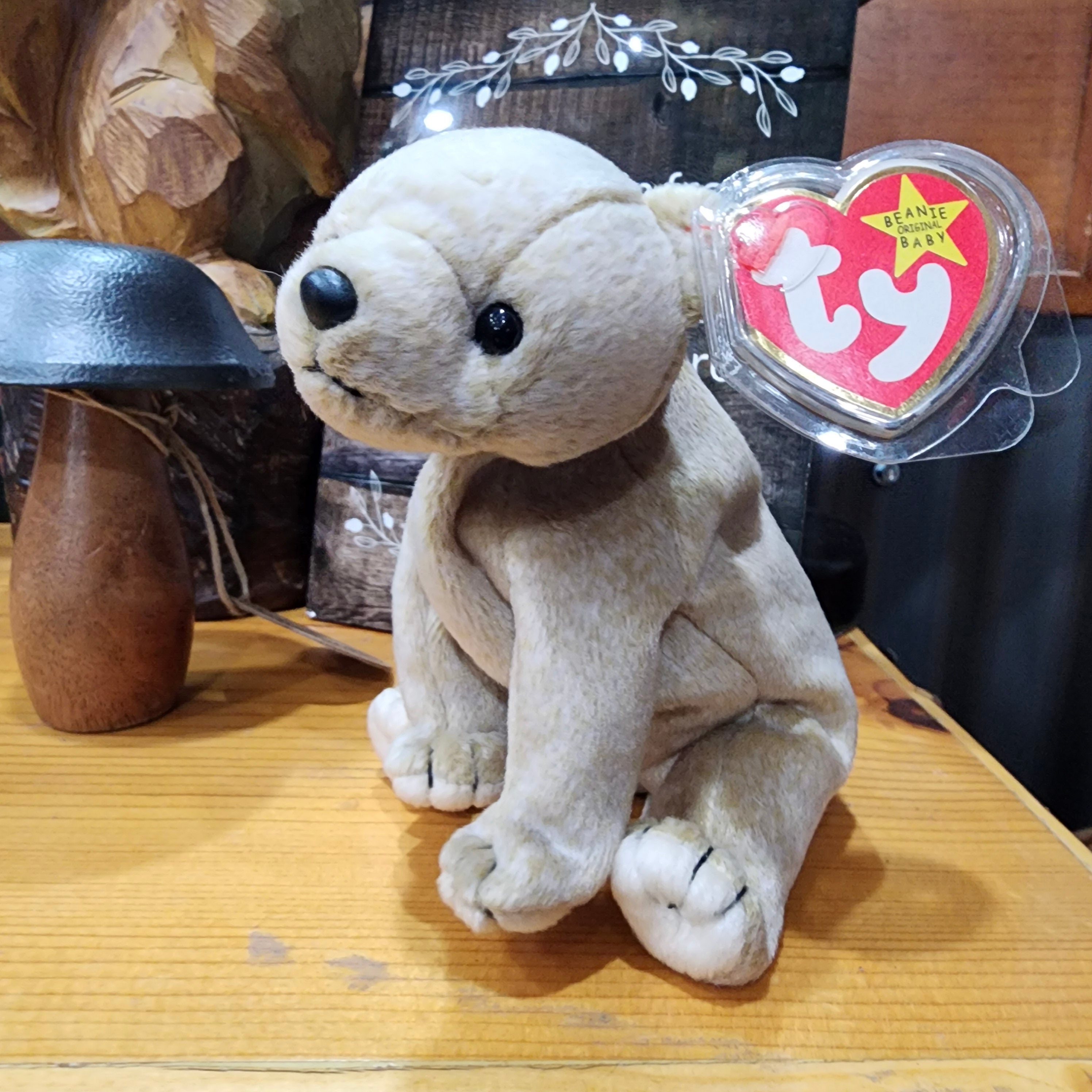 Ty Beanie Babies 'Almond the Bear' plush toy with a white and beige color scheme