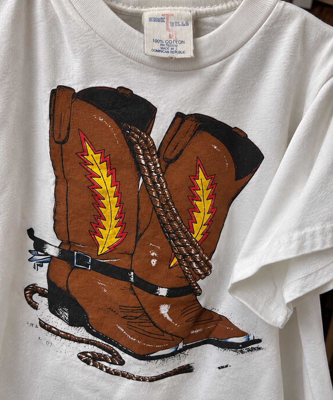 "Short Hill White Tee with Cowboy Boot Graphic"