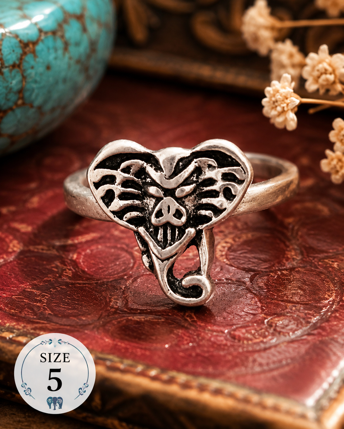 Silver-plated elephant heart ring featuring antiqued detailing and an animal-inspired design, size 5, suitable for everyday wear and unique fashion styling.