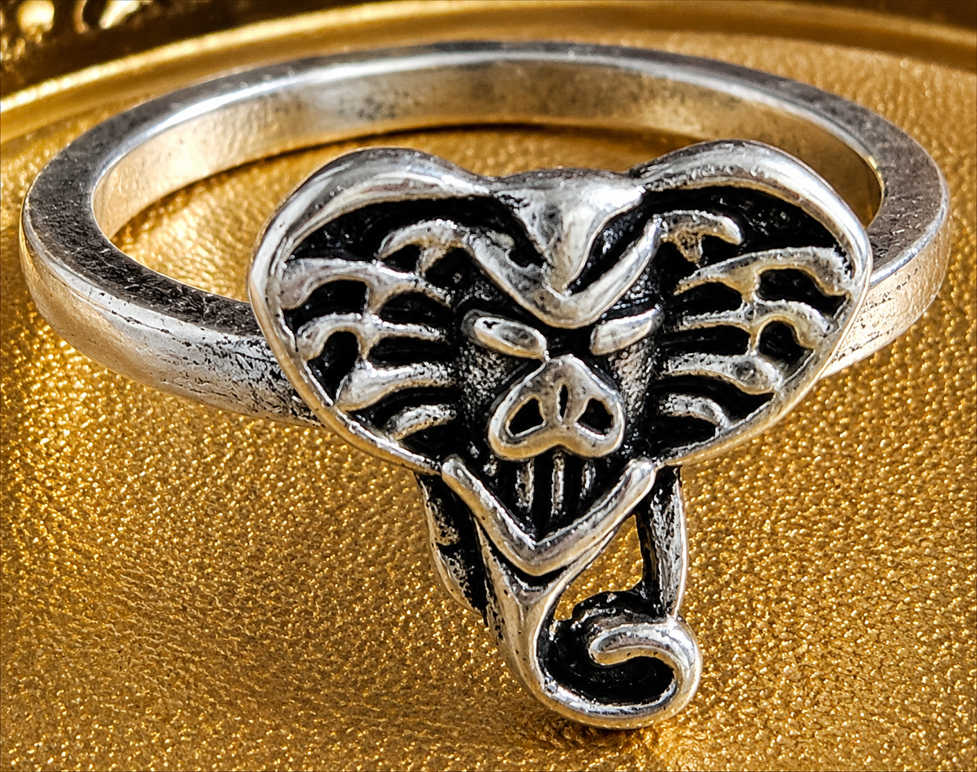 Silver-plated elephant heart ring featuring antiqued detailing and an animal-inspired design, size 5, suitable for everyday wear and unique fashion styling.