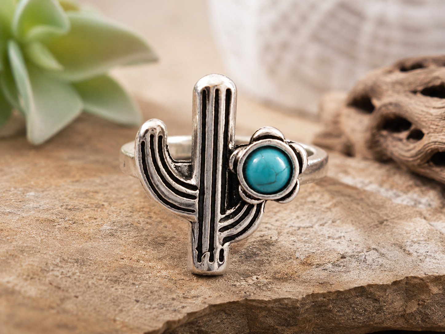 Silver-plated cactus ring featuring a faux turquoise accent stone. Southwestern-inspired jewelry with desert charm, size 6.5, perfect for everyday wear or gifting.