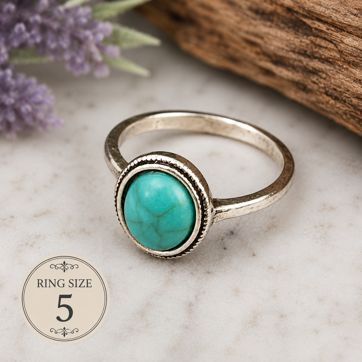 Silver-plated alloy ring featuring an oval faux turquoise cabochon centerpiece with a simple elegant band, size 5, styled for Southwestern and bohemian fashion.
