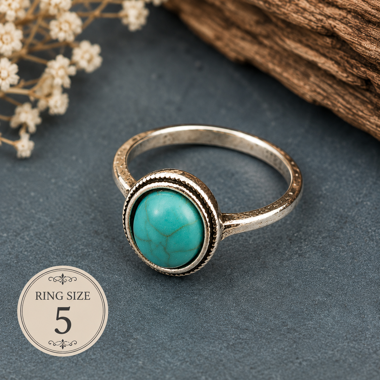 Silver-plated alloy ring featuring an oval faux turquoise cabochon centerpiece with a simple elegant band, size 5, styled for Southwestern and bohemian fashion.