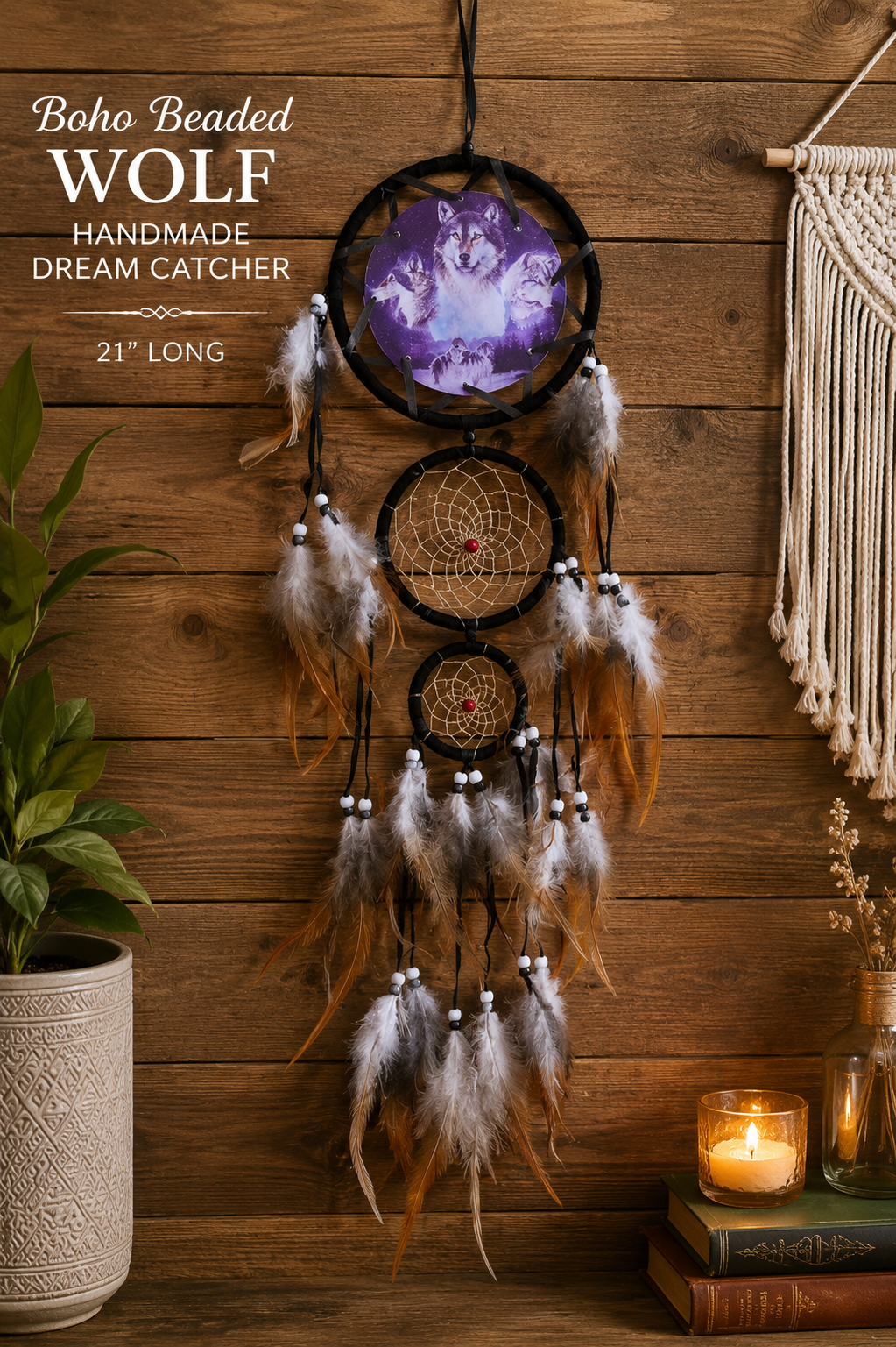 Handmade wolf dream catcher measuring 21 inches long featuring a purple wolf centerpiece, woven dream catcher webs, decorative beads, and cascading natural feathers displayed on a wood wall.