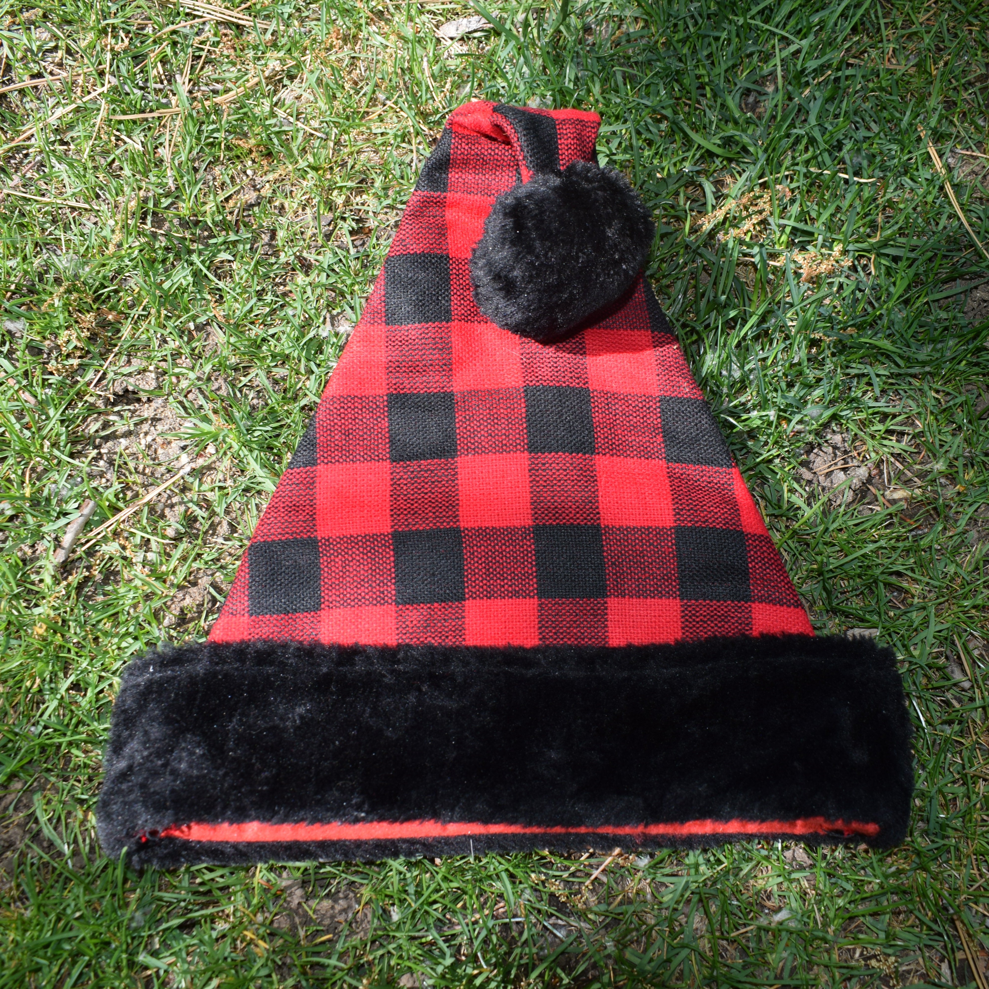 Merry Brite Red Plaid Santa Hat with black Fluffy Trim Adult Size
