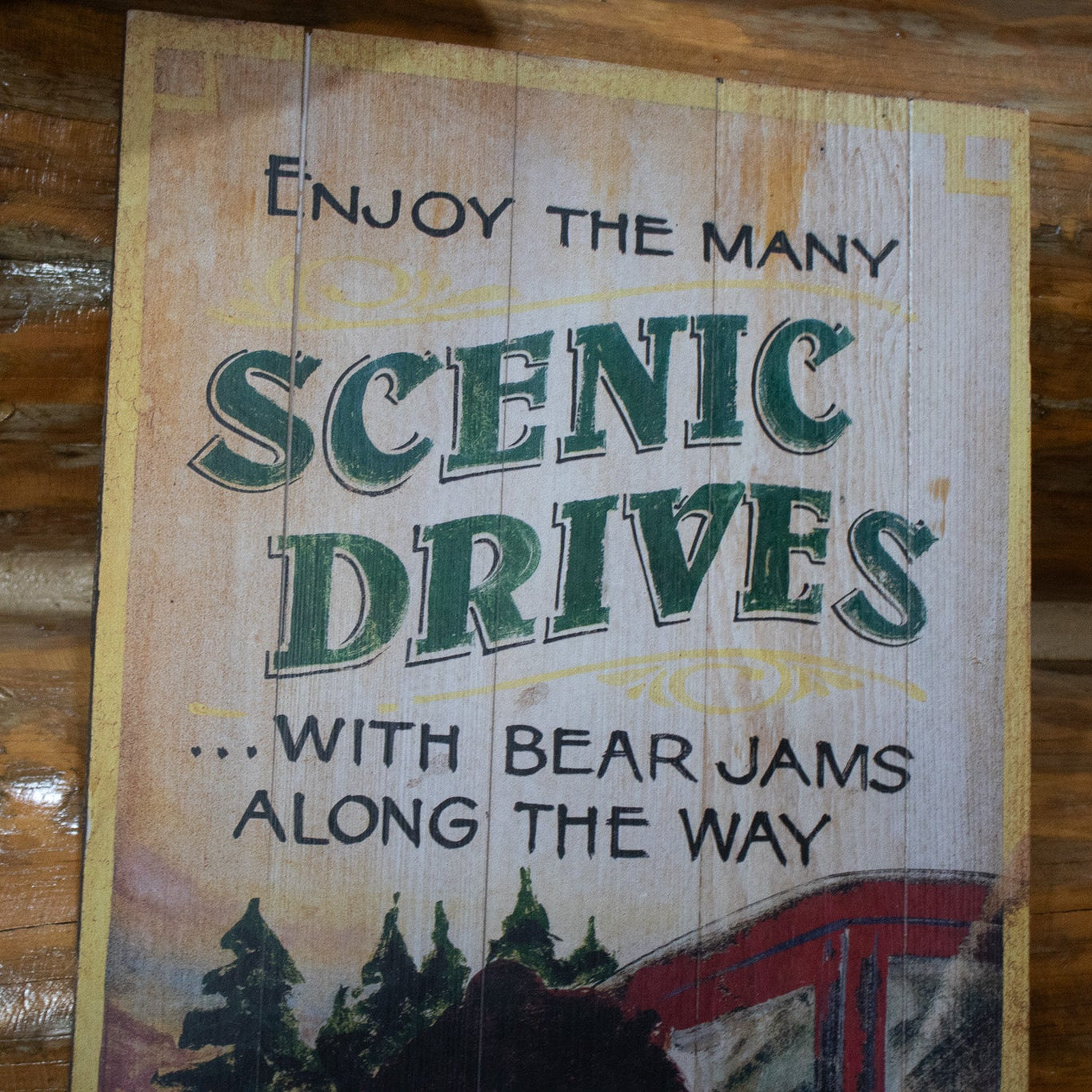 Wooden Plaque Depicting a Large Black Bear Hanging Off of a Red Car "Enjoy the Many Scenic Drives"