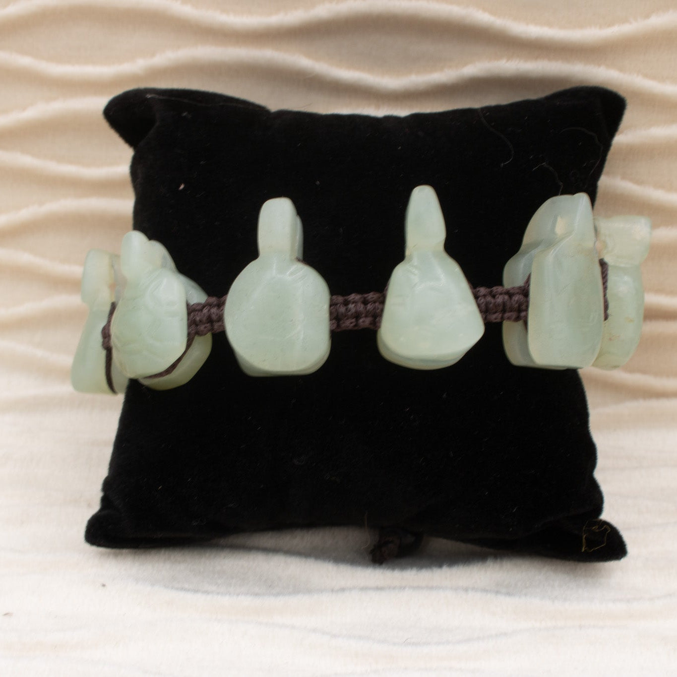 natural jade turtle charm bracelet with hand carved jade beads on adjustable woven cord symbolic Chinese luck jewelry