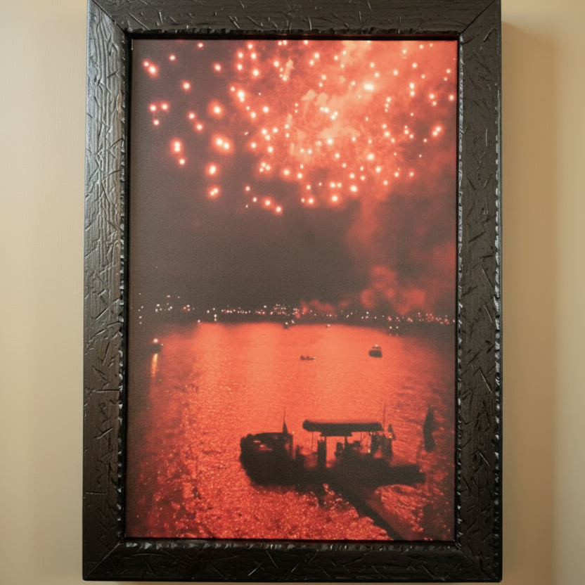 large framed original John Hummel photograph featuring vivid red fireworks over Big Bear Lake California reflected on water at night