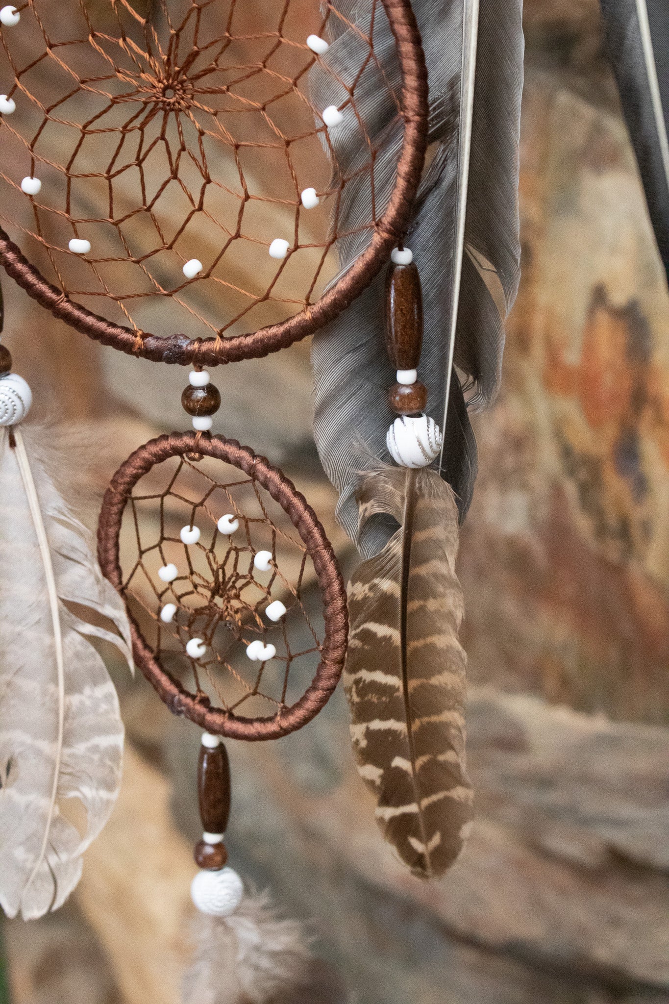 Dark Brown Dream Catcher with Braided Flower and Large Feather Tassels