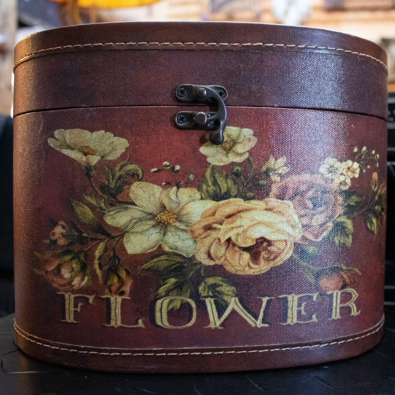 Elegant Dark Red Oval Box with Floral Design