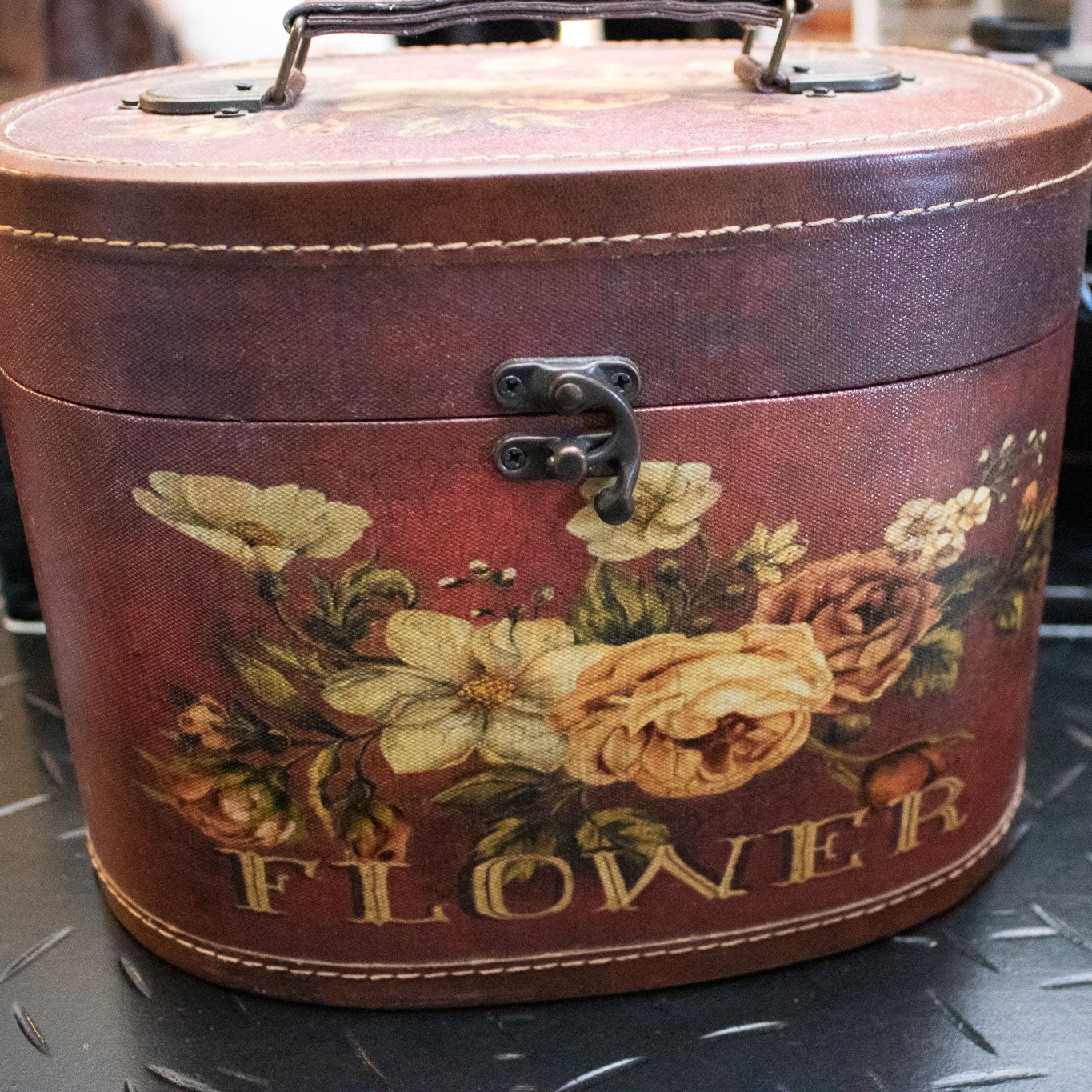 Elegant Dark Red Oval Box with Floral Design