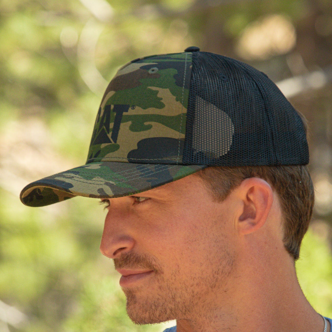 Trucker Cap with Cat Logo Color: Woodland Camo