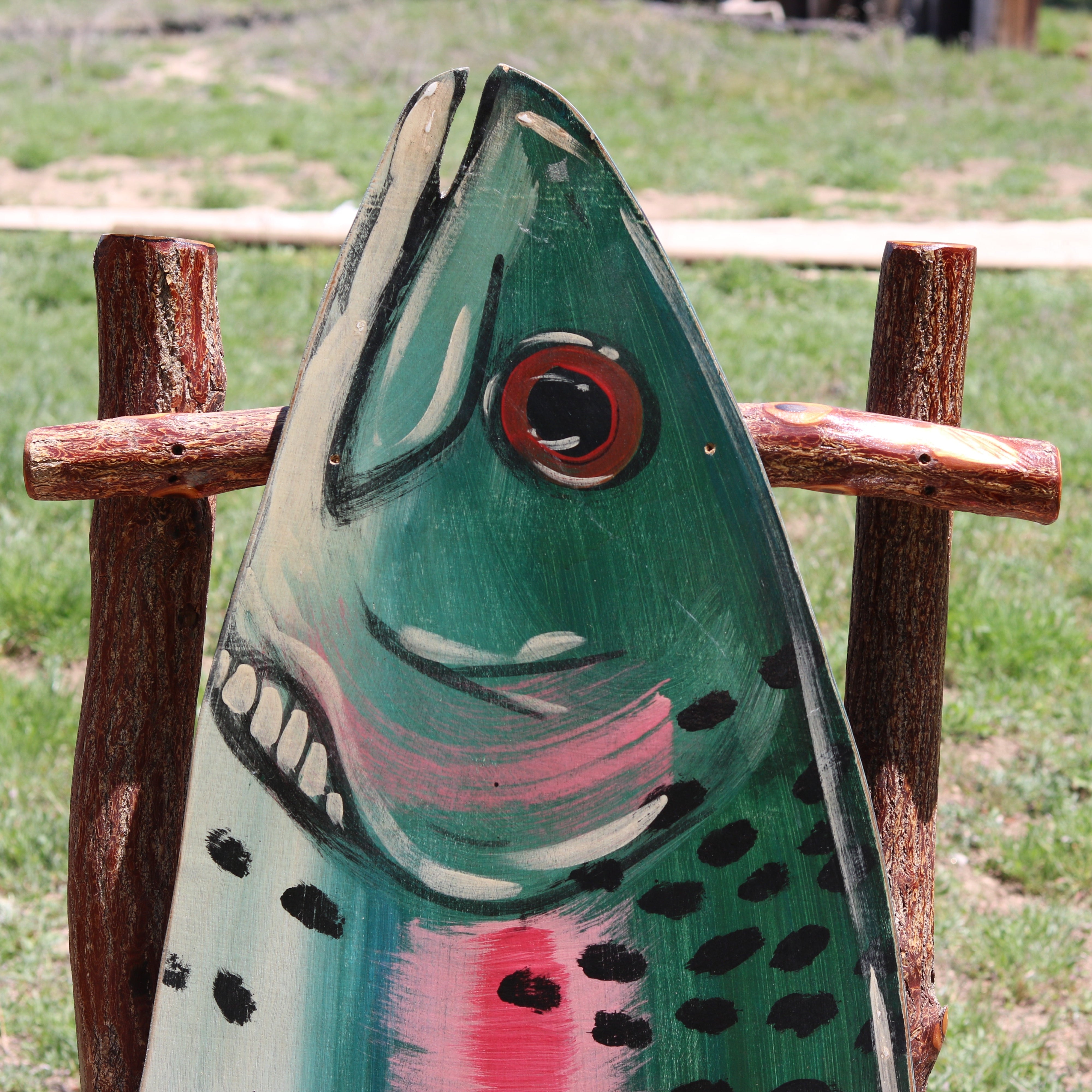 Natural Log Trout Fish Armchair Depicting a Realistic Rainbow Trout as the seat