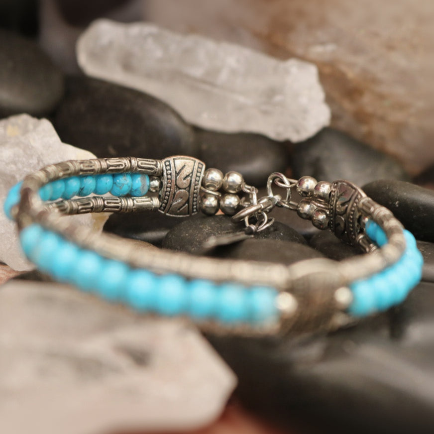 Tibetan Turquoise Colored Gemstone Feather Bracelet