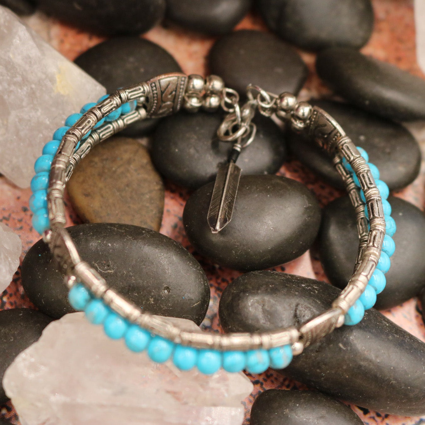 Tibetan Turquoise Colored Gemstone Feather Bracelet