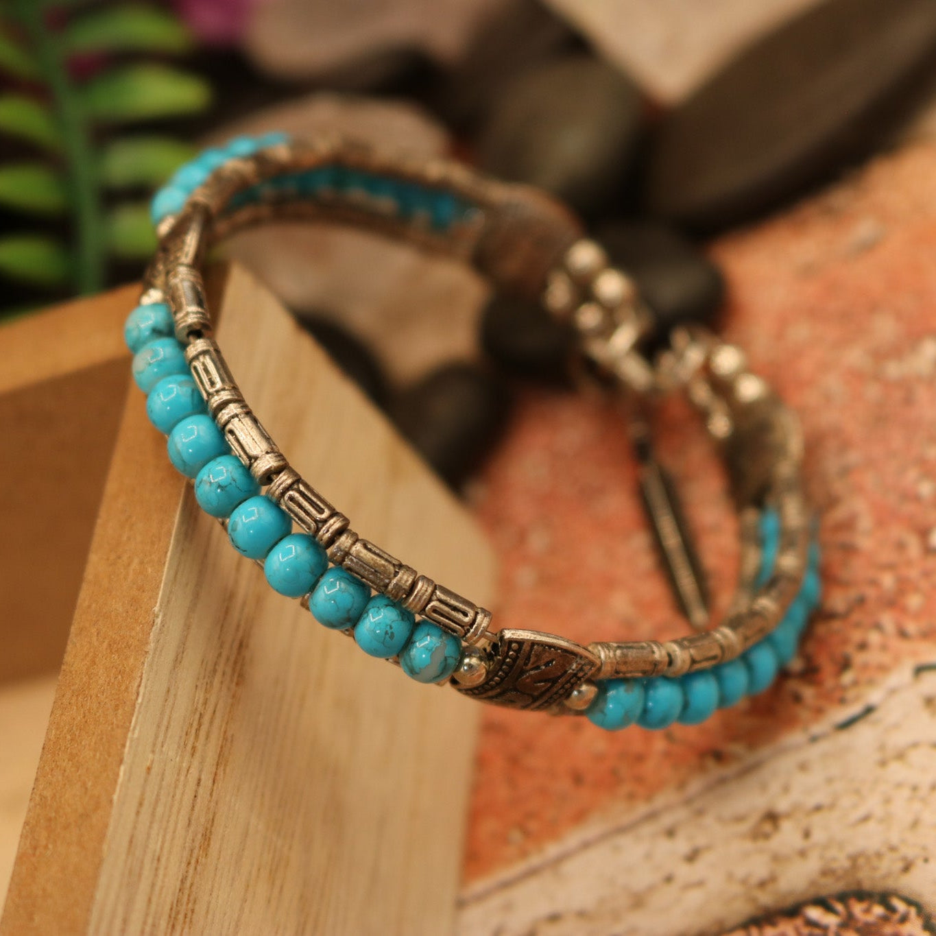 Tibetan Turquoise Colored Gemstone Feather Bracelet
