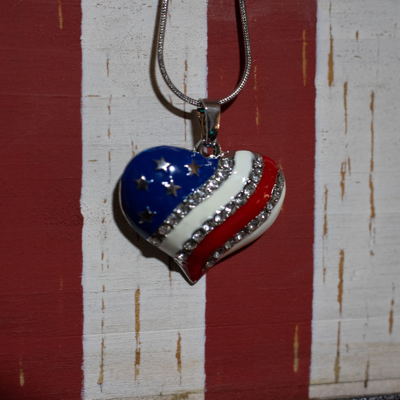 Heart-shaped pendant with American flag design
Heart American Flag Charm Necklace