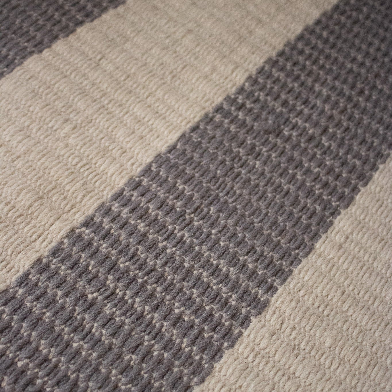 Hand-woven Wool Rug Grey and White colored Stripe Print