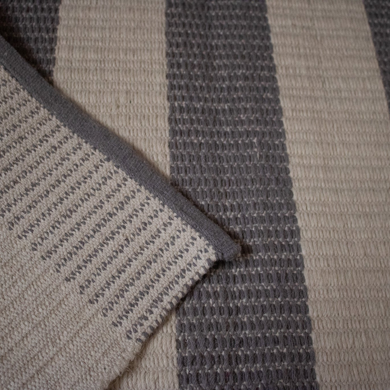 Hand-woven Wool Rug Grey and White colored Stripe Print