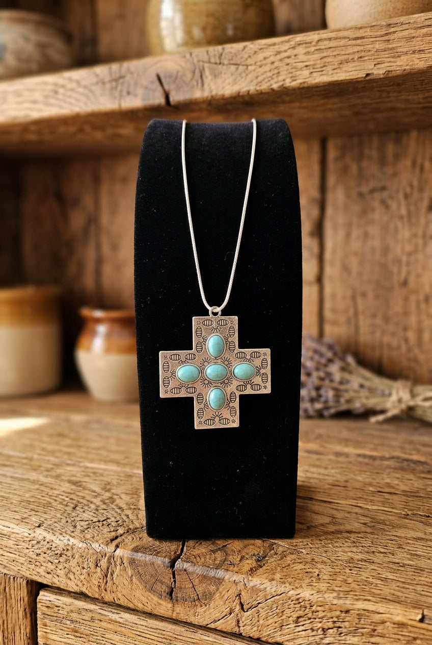 Faux Turquoise Cross Necklace with Engraved Sunburst Details