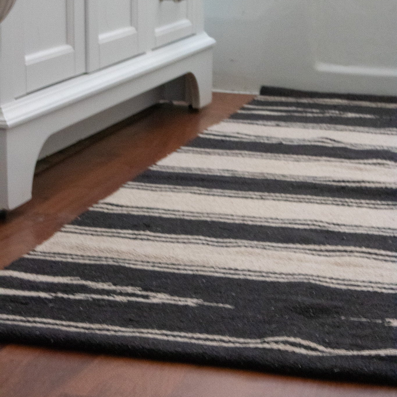 Modern Black and Tan Colored Striped Wool Rug