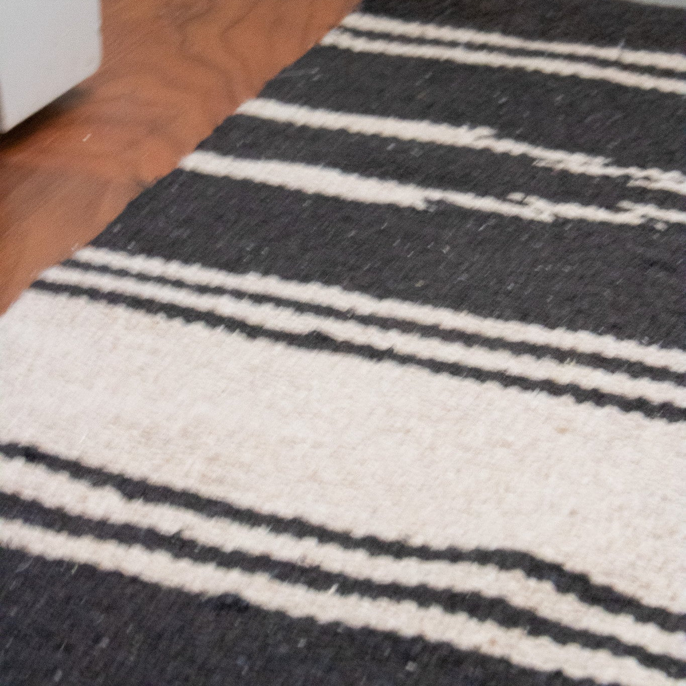 Modern Black and Tan Colored Striped Wool Rug