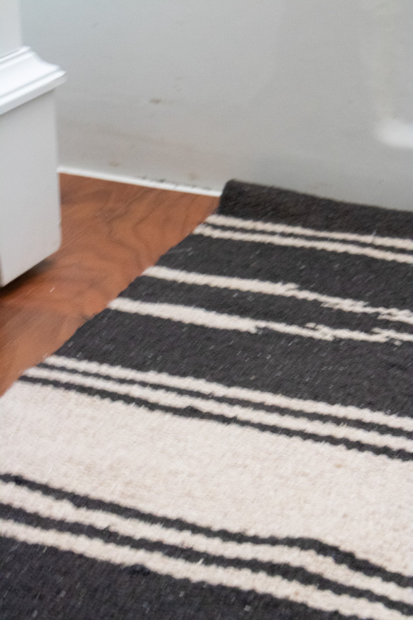 Modern Black and Tan Colored Striped Wool Rug