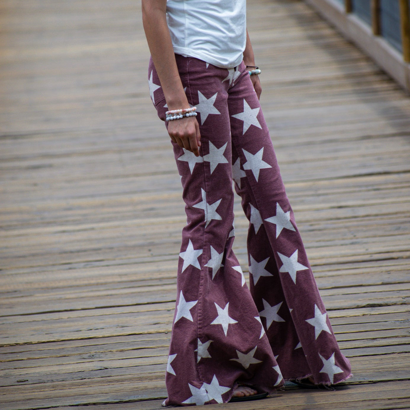 Altar'd State Red and White Stars Bell Bottom Jeans.
