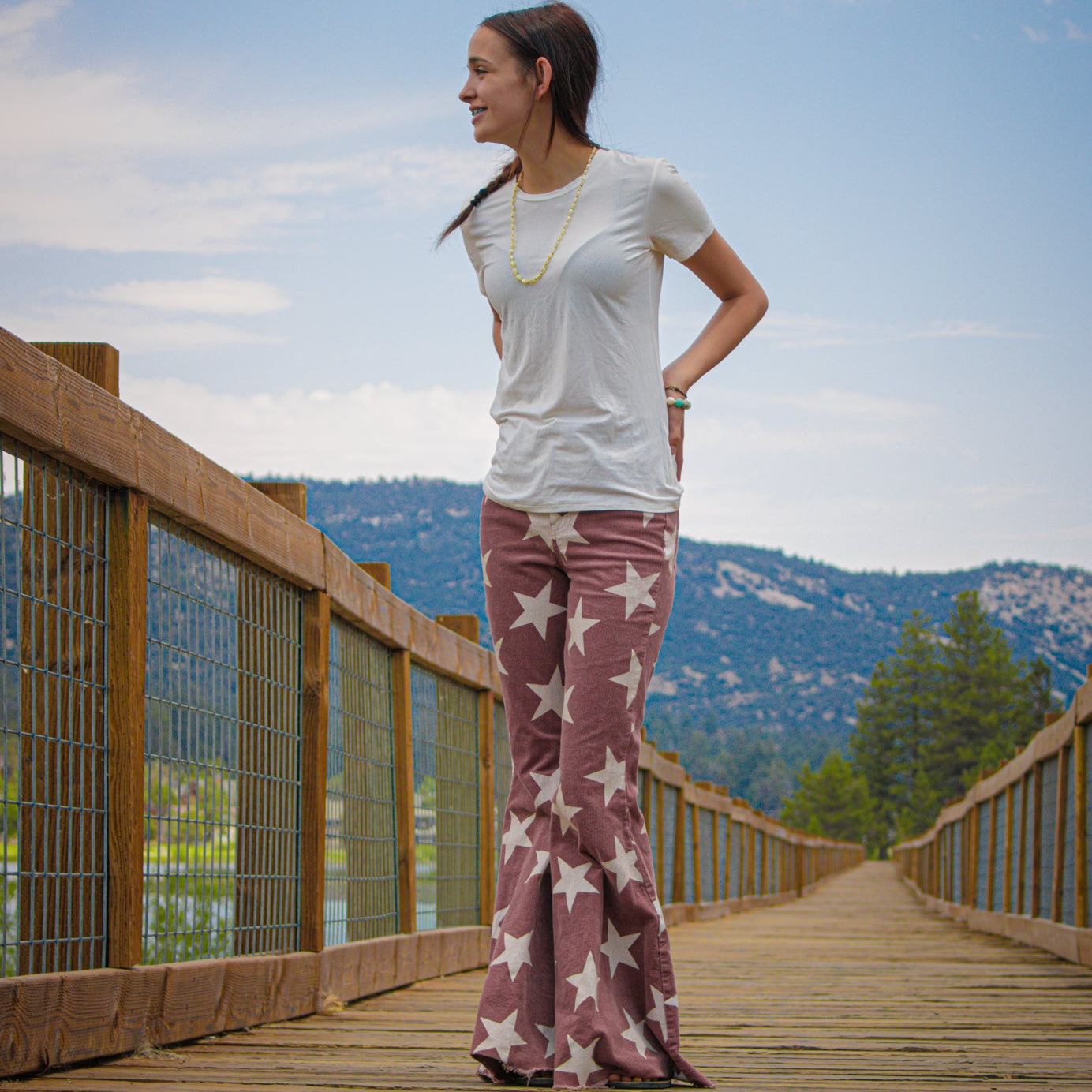 Altar'd State Red and White Stars Bell Bottom Jeans.