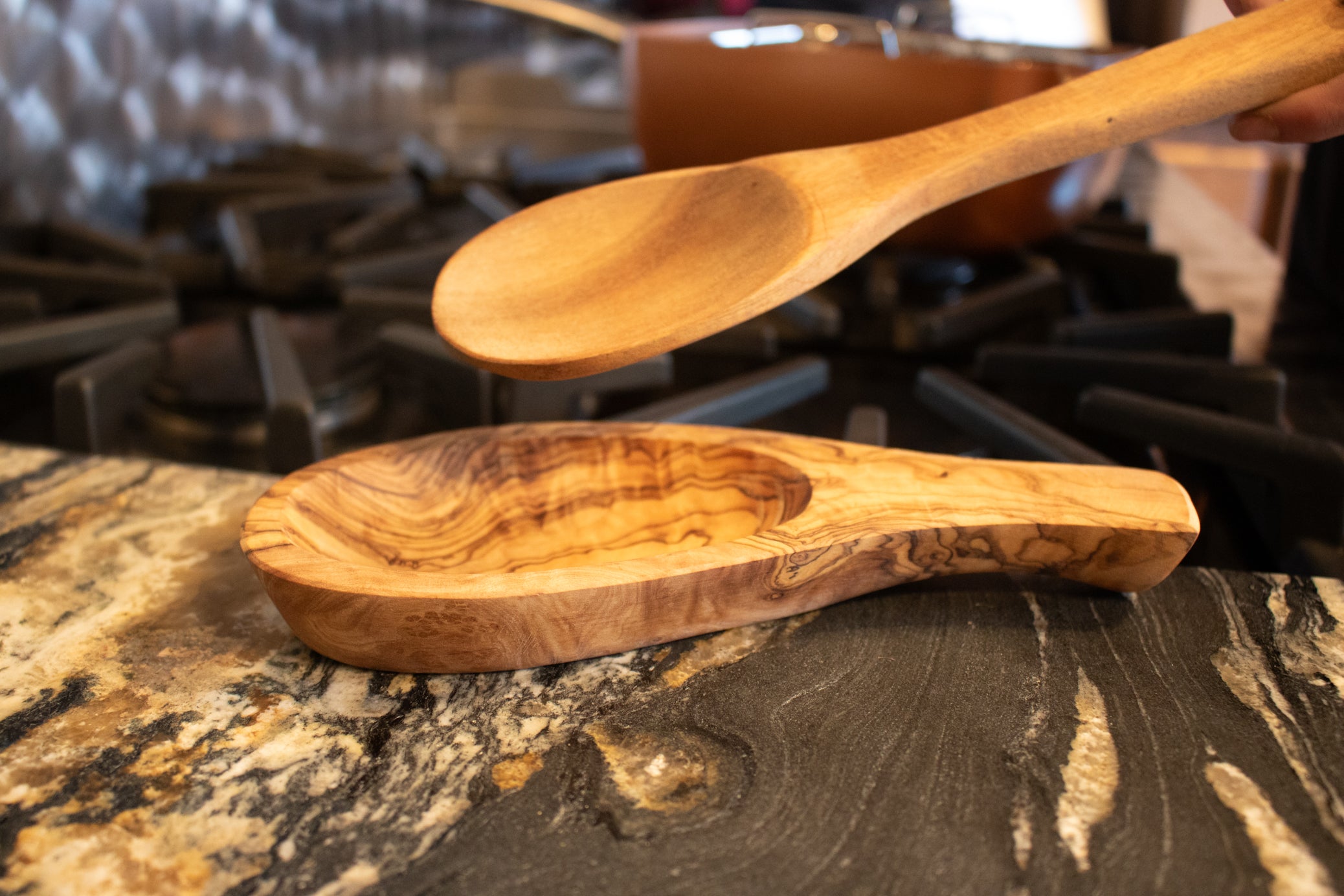 handcrafted olive wood spoon rest with rich natural grain and carved utensil basin rustic kitchen accessory