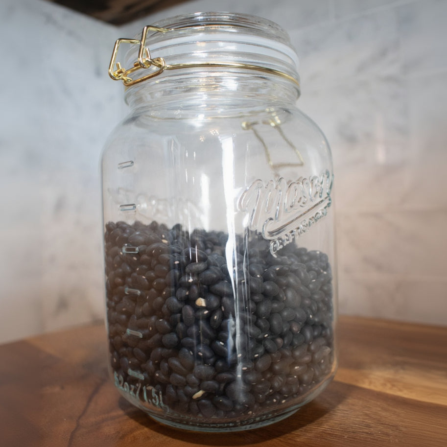 Mason Jar with gold clamp on lid