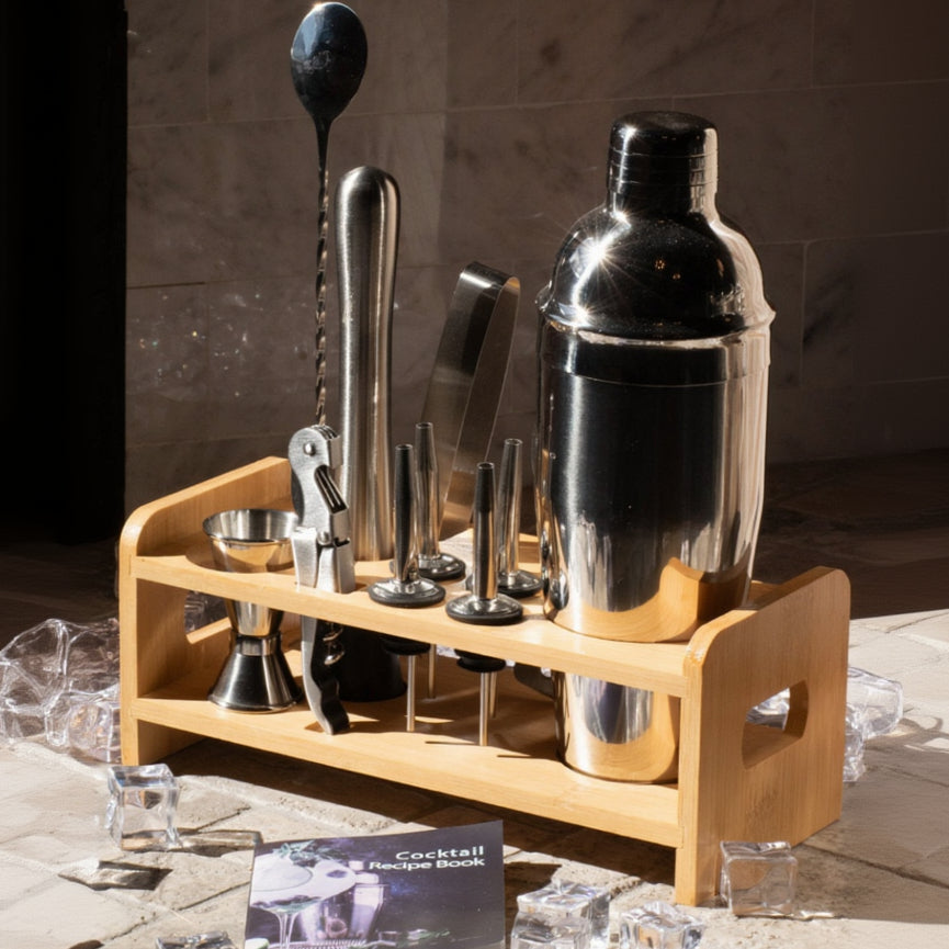 A mixology cocktail kit with a silver bar set, including a martini shaker, jigger, strainer, bar mixer spoon, tongs, and an opener, Mixology Bartender Kit with Stand Bar Tool Set