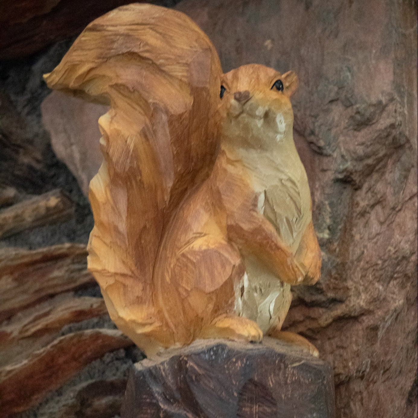 Resin Squirrel Sculpture Perched on Tree Stump