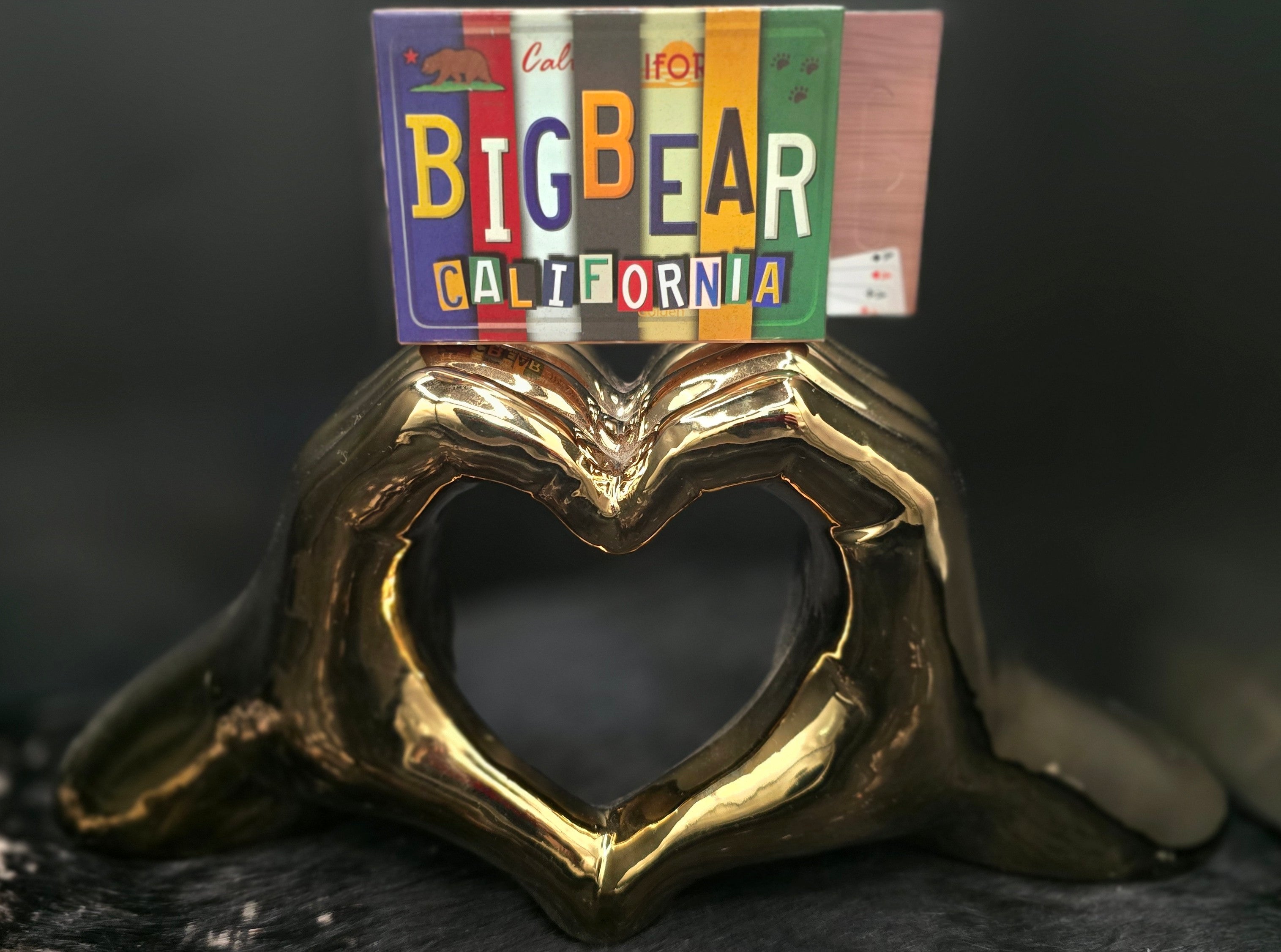 big bear california playing card deck with colorful vintage california license plate collage artwork on storage box
