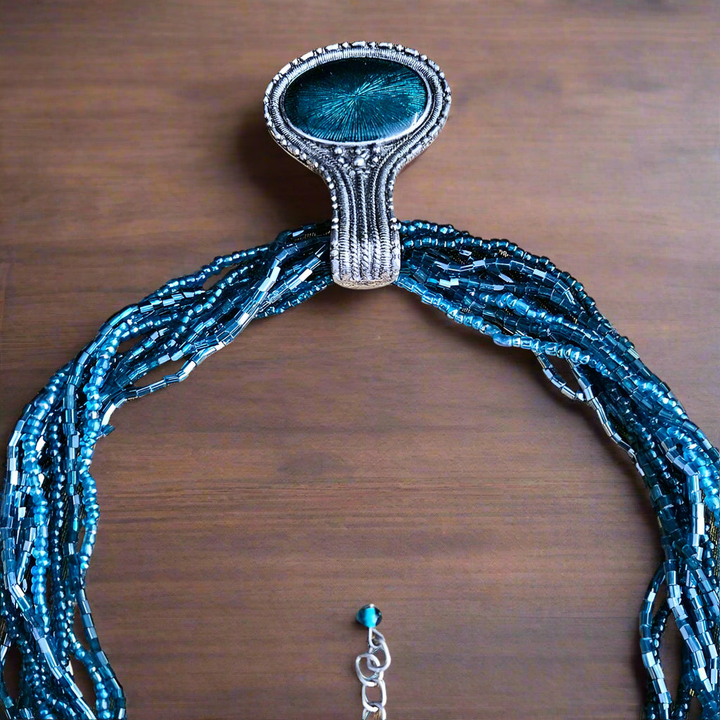 Teal Blue Beaded and Sterling Silver Blue Charm