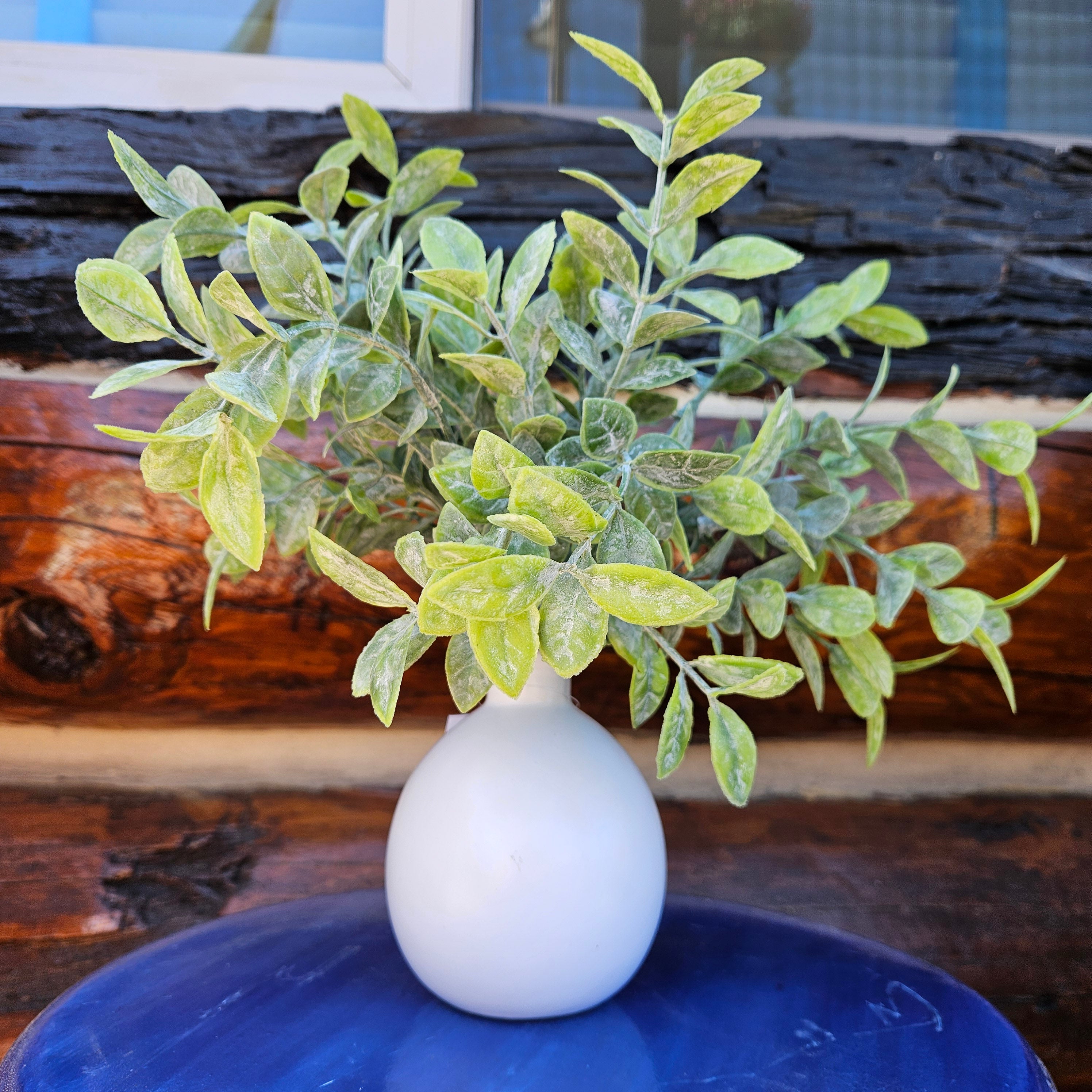 Faux Powdered Tea Leaf in a White Rounded Ceramic Vase