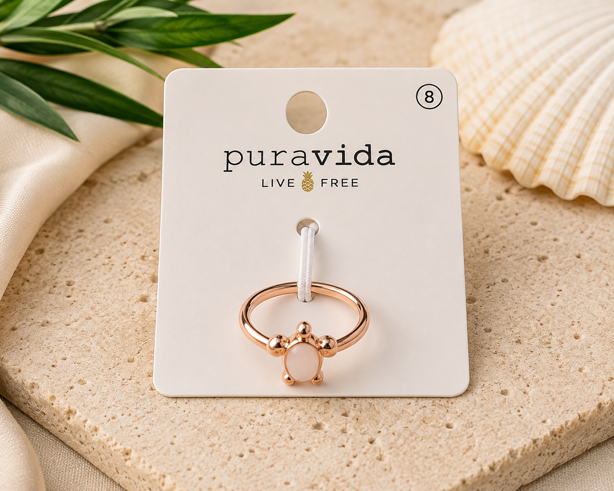 Authentic Pura Vida rose gold-tone size 8 ring featuring a white enamel mouse-inspired design on the original display card, new and unworn.