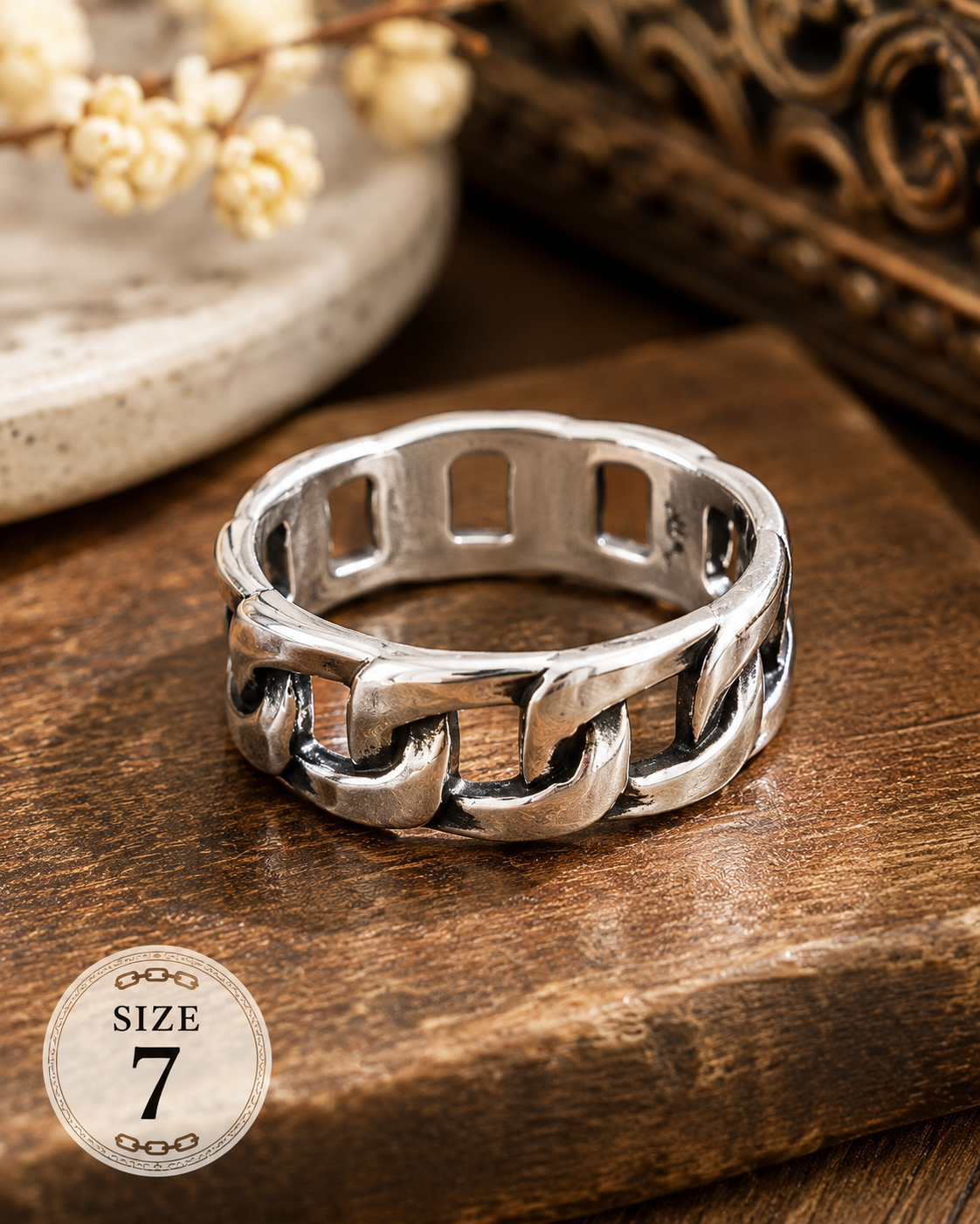 Silver-plated chain link band ring featuring an interconnected link design, size 7, with a modern and versatile fashion-forward style suitable for everyday wear.