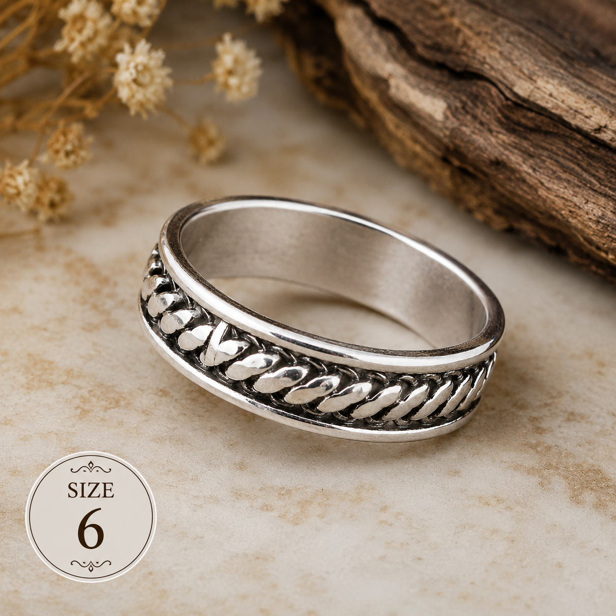 Silver-plated braided band ring featuring an intricate woven texture design, size 6, suitable for everyday wear, stacking, and minimalist fashion styling.