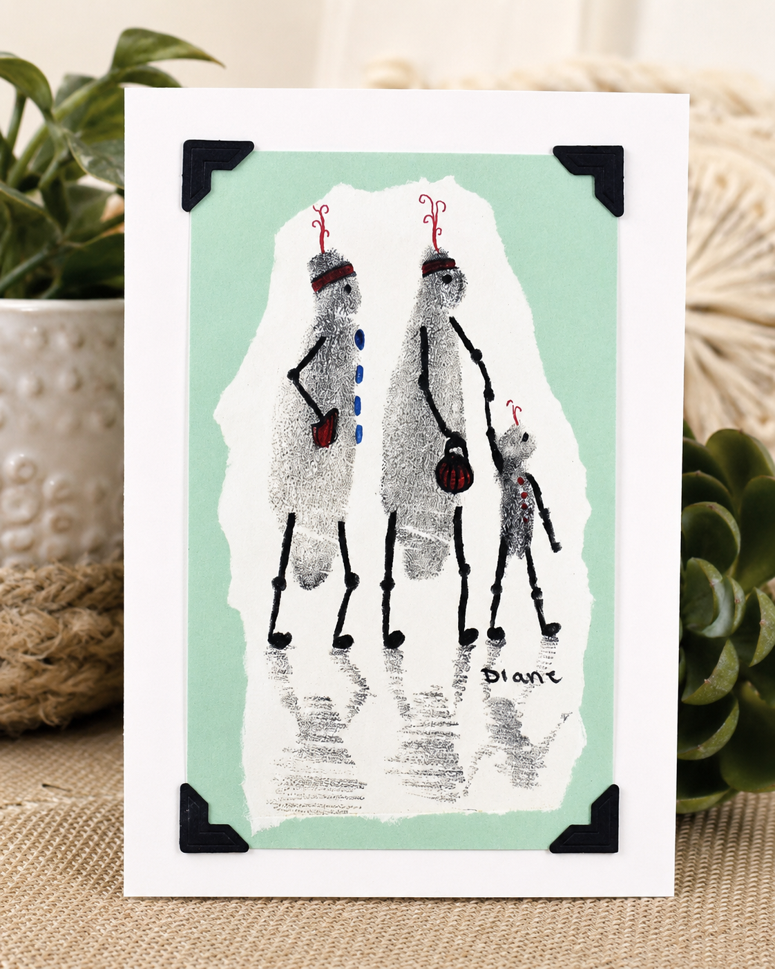Original 5x7 handmade greeting card by Diane Stegman featuring whimsical fingerprint family characters, part of the Your Inner Voice Fingerprint Series, signed and dated 2023.