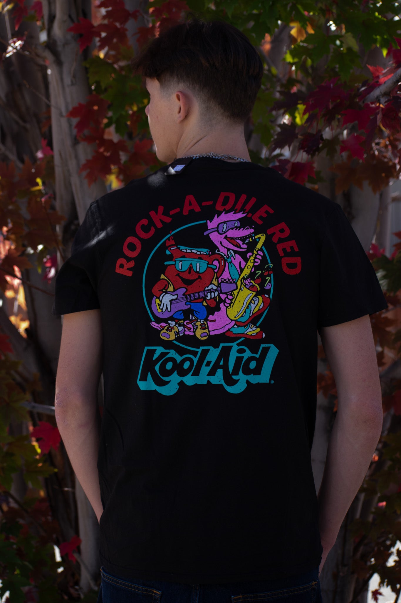 Black shirt with a Kool Aid print on the back