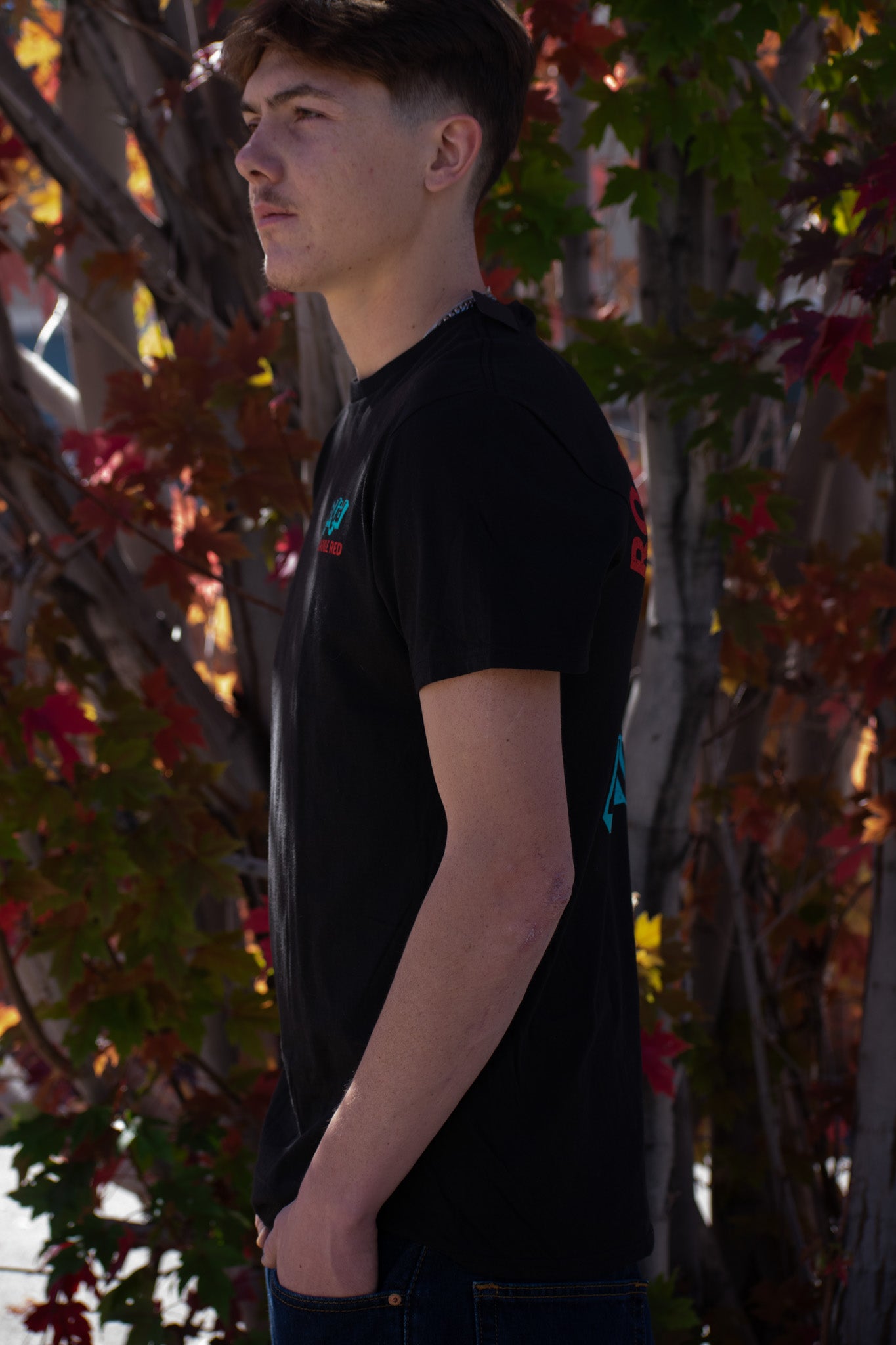 Black shirt with a Kool Aid print on the back