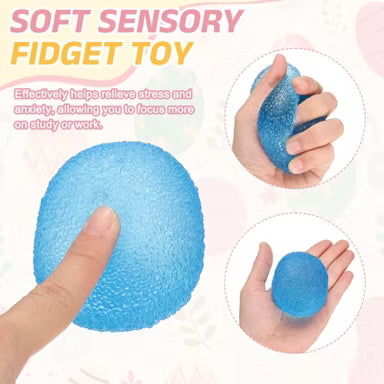 Blue gumdrop-shaped slow-rise squishy toy with a textured bead-like surface, individually packaged and designed for stress relief, sensory play, and fidgeting.