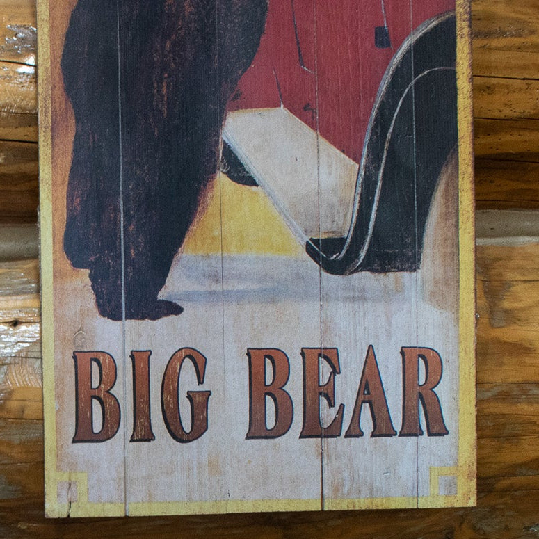 Wooden Plaque Depicting a Large Black Bear Hanging Off of a Red Car "Enjoy the Many Scenic Drives"