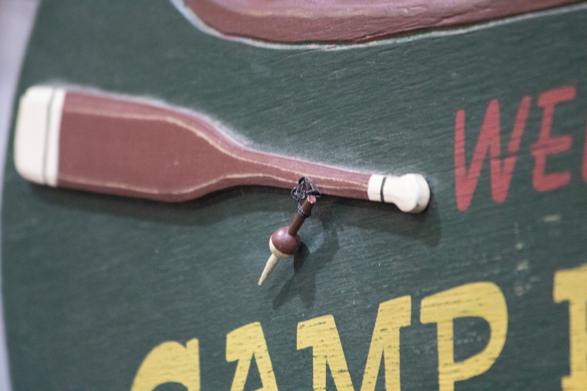 Wooden Green Painted Canoe "Welcome to Camp Run-Muk" Wooden Sign