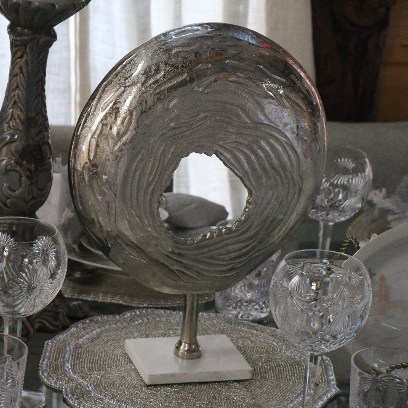 Beautiful Circular Modern Art Piece with White Marble Base with an Impression of the Modern Abyss