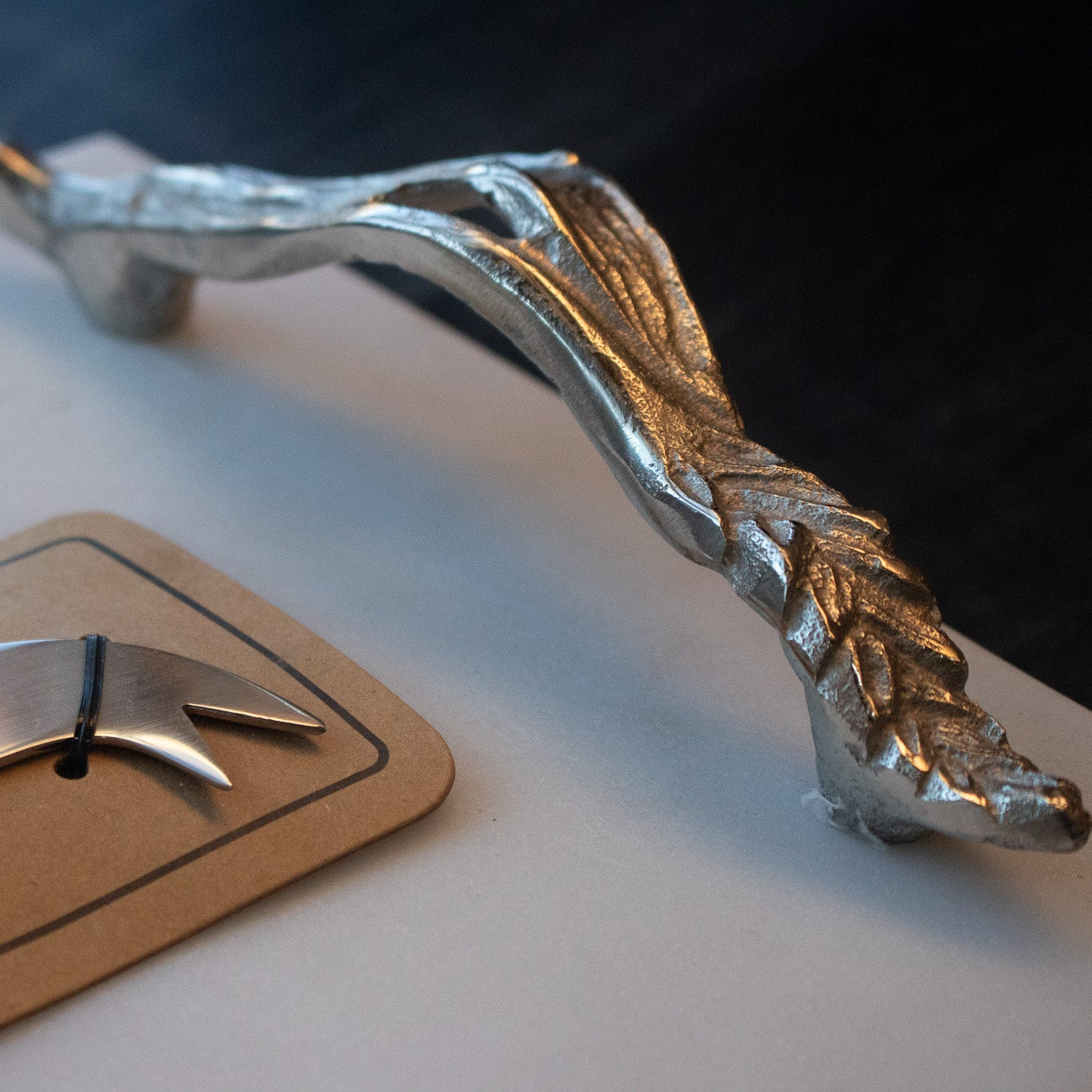 Elegant Marble Cheese Board with Chrome Leaf Handles and Chrome Cheese Knife